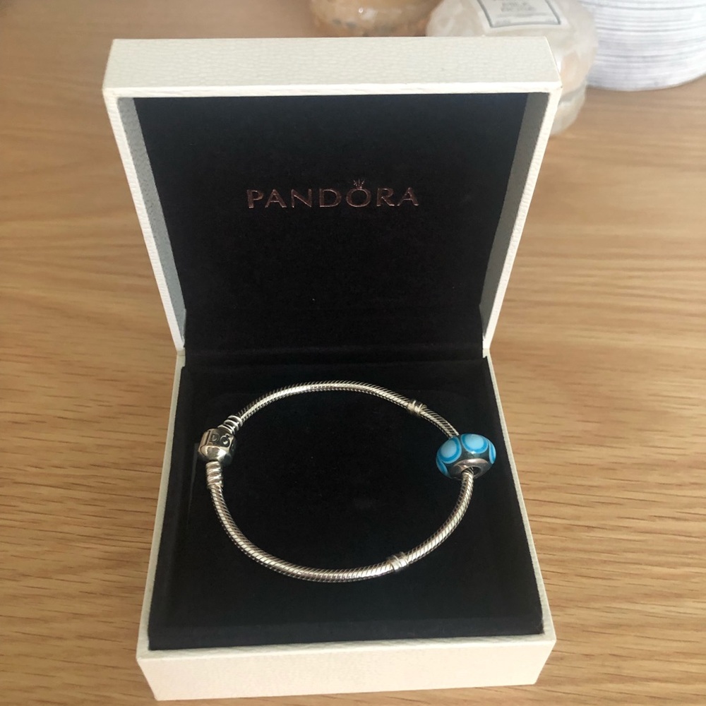 Pandora bracelet with charm. Never worn